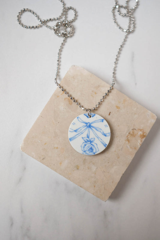 Collana fiocco azzurro